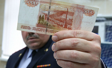 В СВАО полиция арестовала мошенников с фальшивыми банкнотами